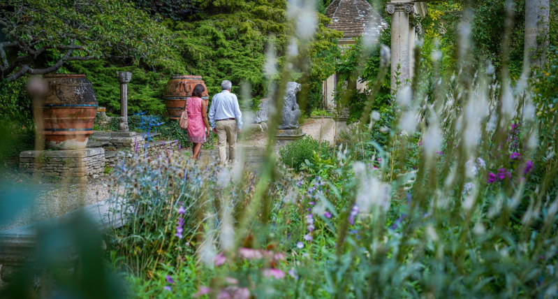 Couple Walking around Iford Manor Gardens